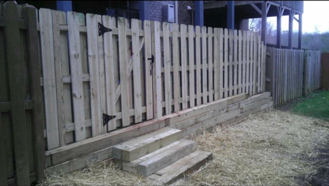 Fence & Timber Retaining Wall - After