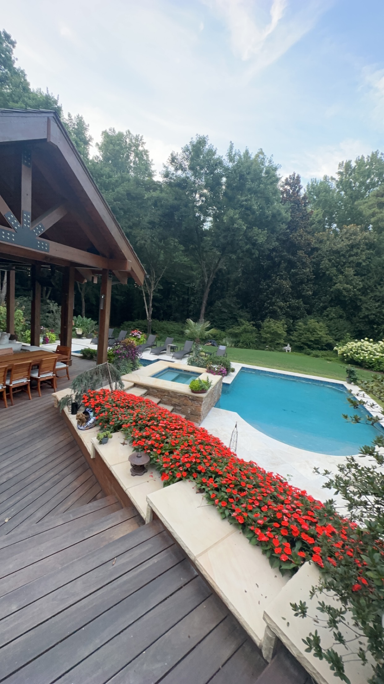 Pool deck with red impatiens