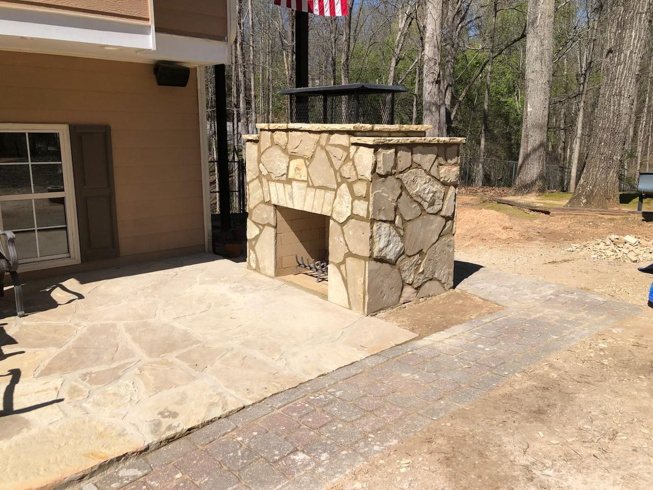 Patio fireplace with flagstone